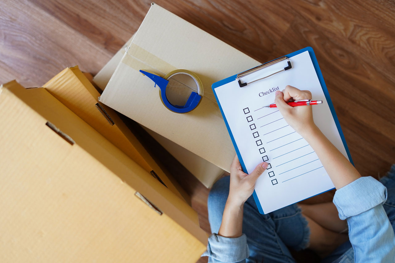 Top view woman checking goods package packing before delivery shipping prepare move new house with checklist 123441 68